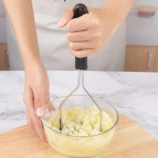 Manual potatoes and garlic masher