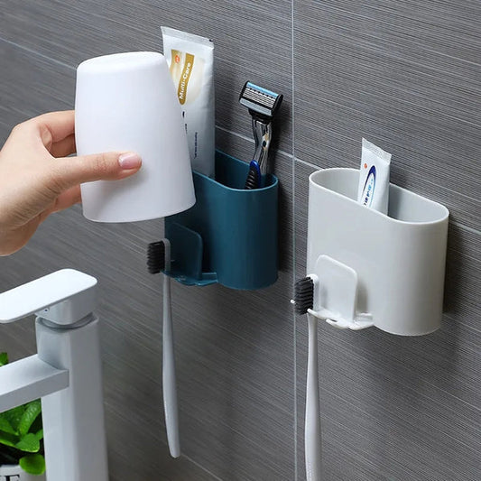 Wall mounted bathroom organizer for tooth paste and tooth brush